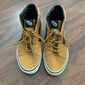 Tan high-top vans